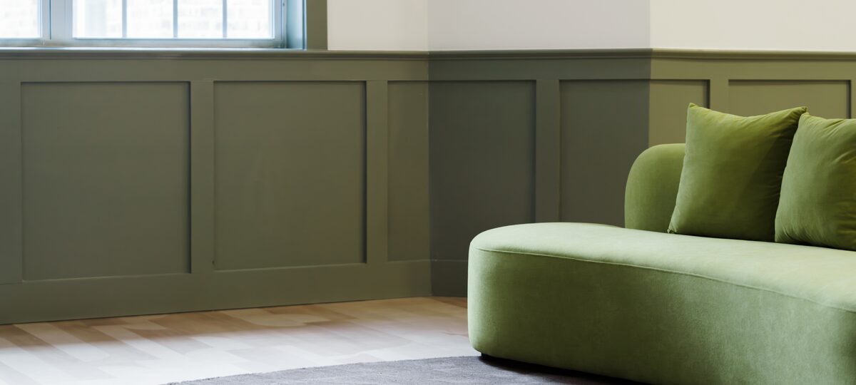 Lounge seating in a wood-panelled common room